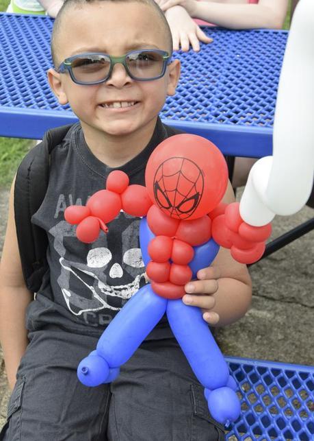 Camper with his balloon SpiderMan