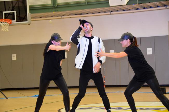 JLine and his dance crew performing