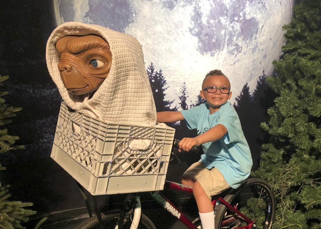 Camper at Wax Museum with ET on bicycle