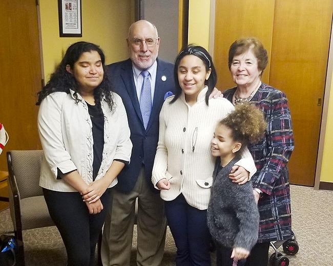 NYS Assembly Member Michael Benedetto with students from NYI